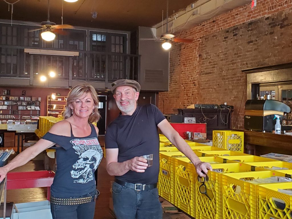 Astro Records owner Kevin Mawby & 602 Brewing bartender Kymberly Lind drinking the 'Lippy'